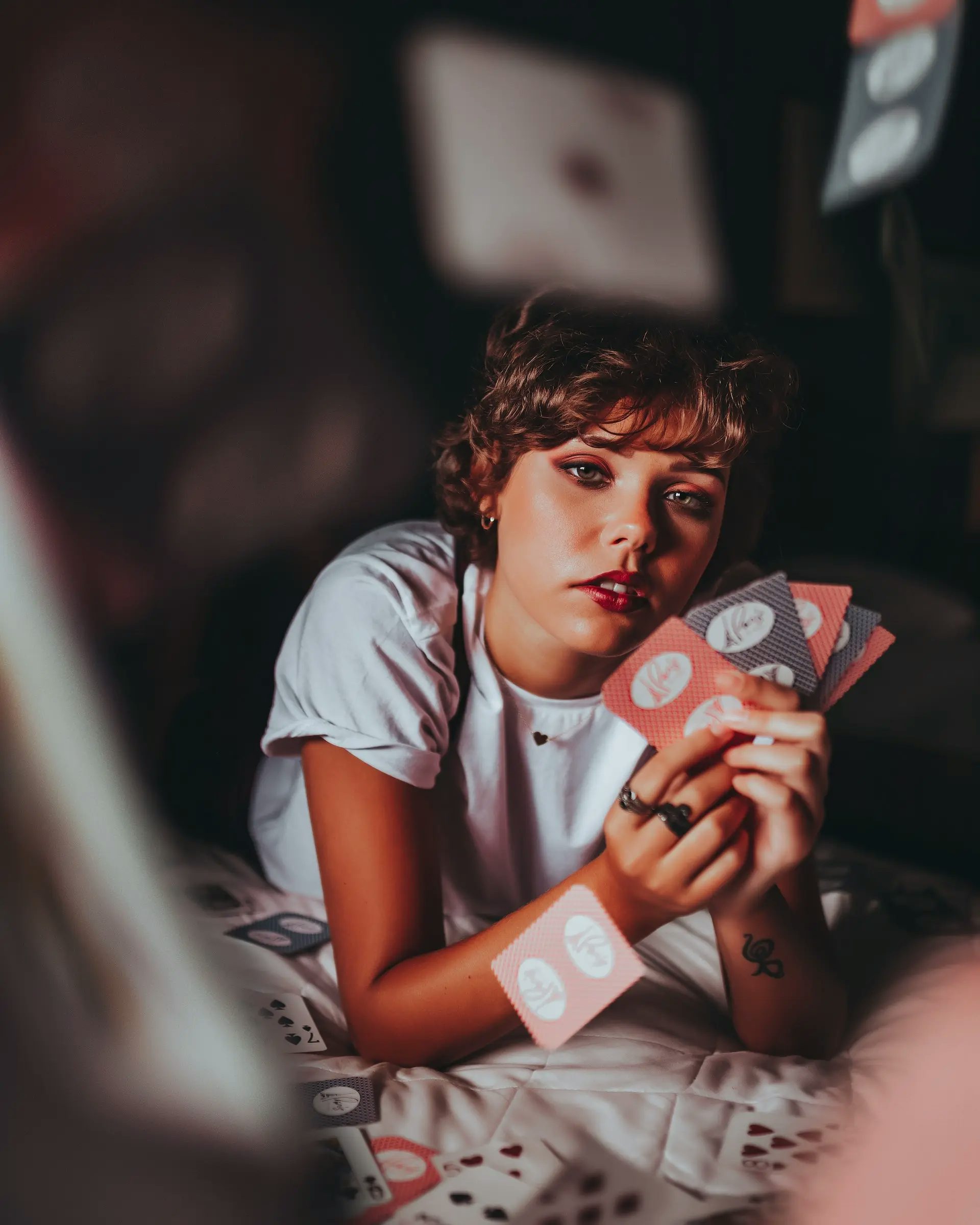 Date night cards, Photo by Matheus Bertelli: https://www.pexels.com/photo/woman-holding-red-and-black-cards-2044472/